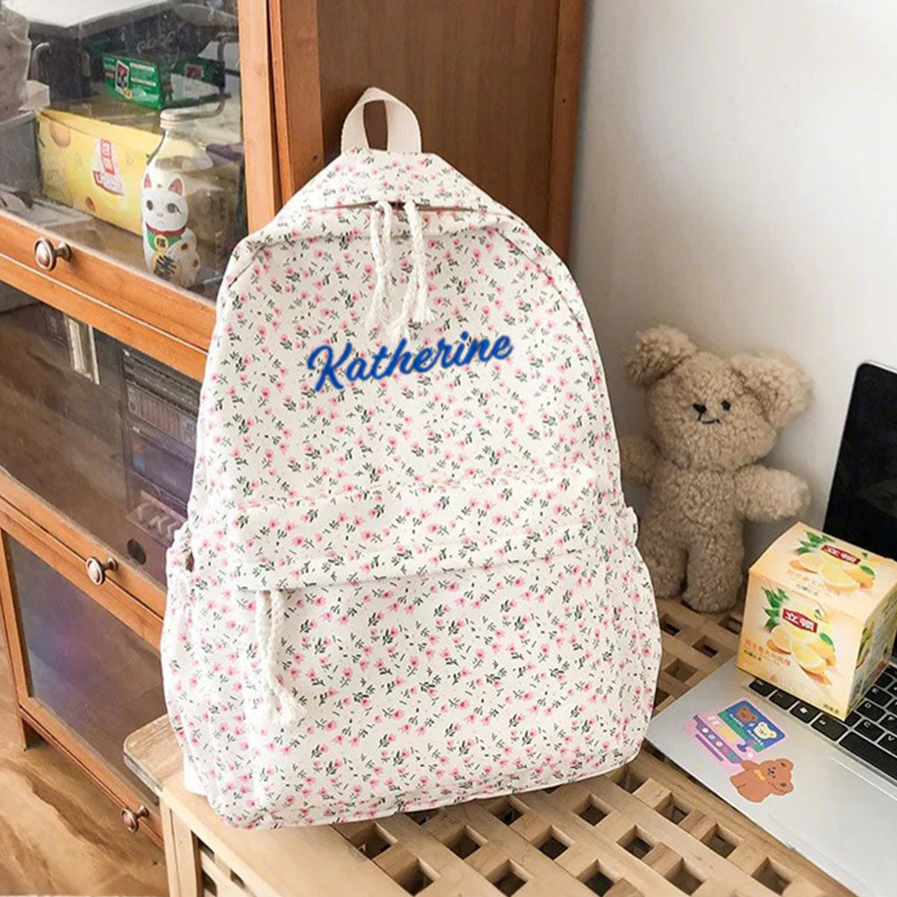 Close-up of personalised name lettering on flower girl schoolbag – custom name detail on durable nylon student backpack