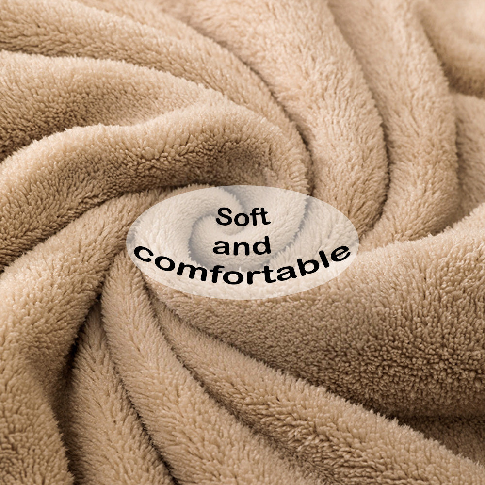 Detailed view of reinforced stitching around custom embroidery on coral fleece towel to prevent fraying and ensure durability
