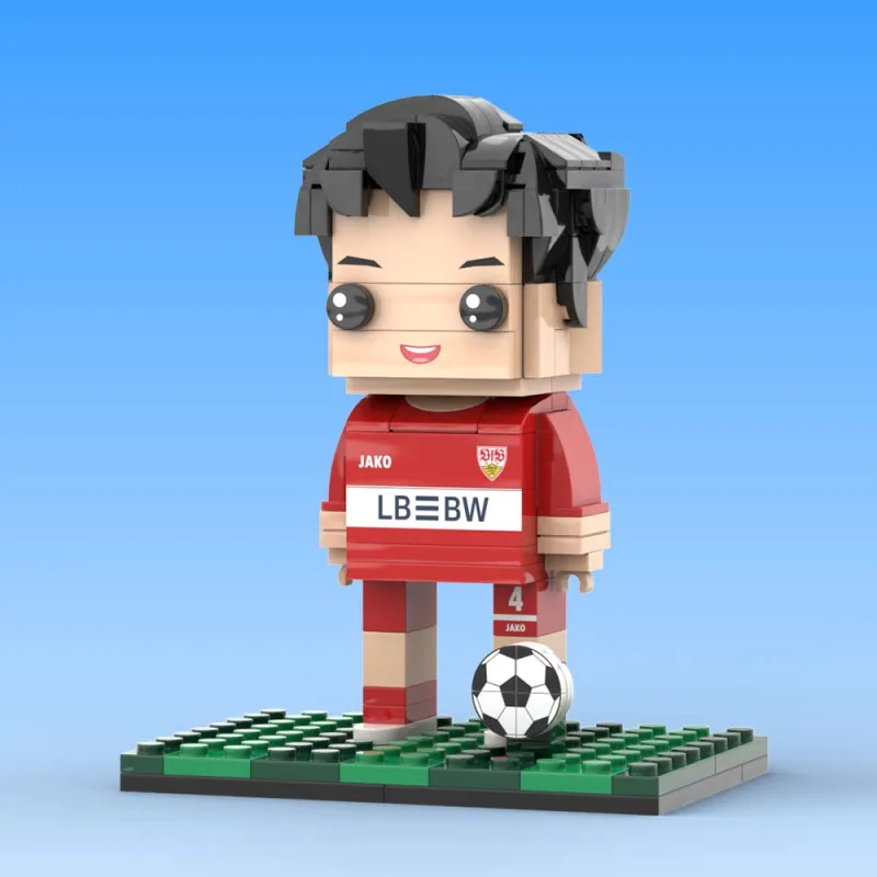 Close-up of personalised brick figure face showing custom hairstyle and expression in light nougat skin tone – custom football figure