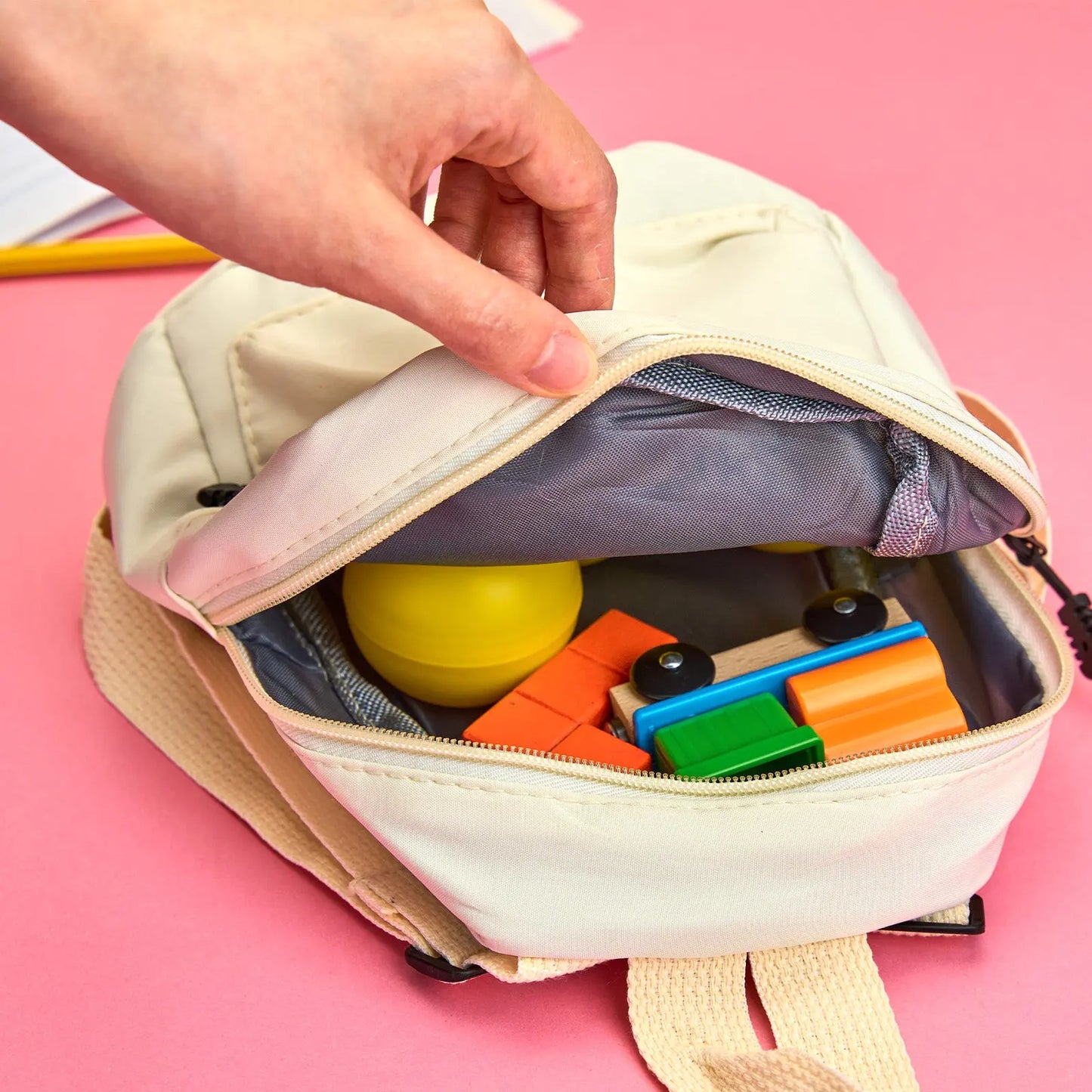 Close-up of embroidered name on personalised mini backpack highlighting premium stitching and personalised detail