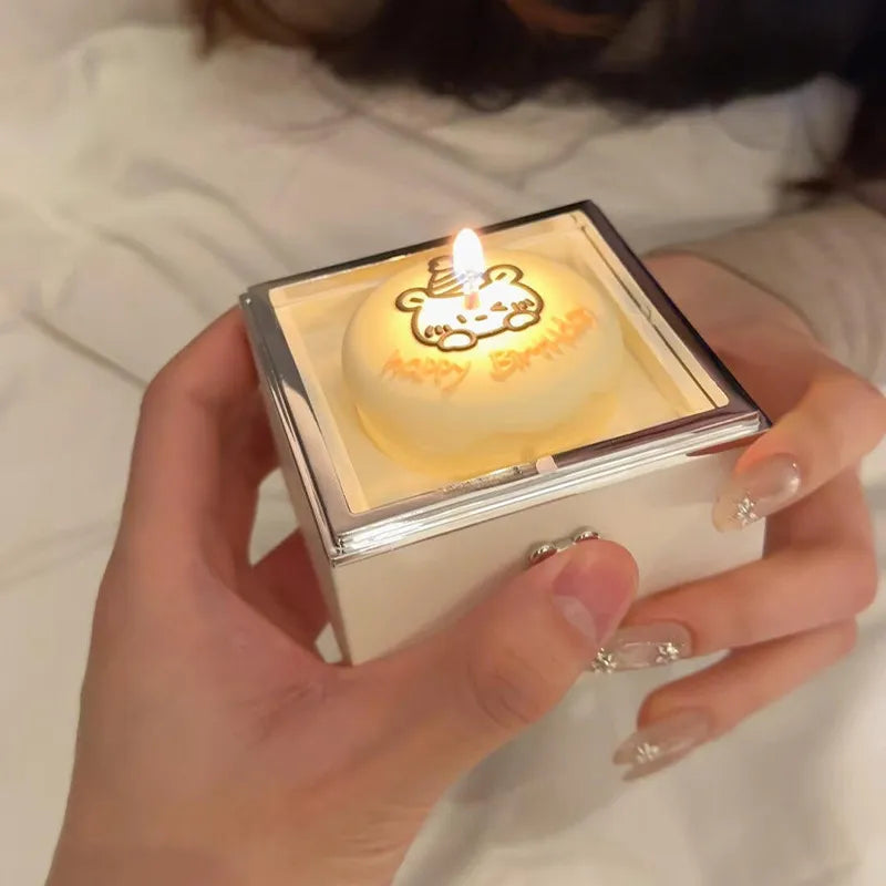 Bear Cake Ring Box in copper with flickering candlelight and rotating ring reveal — elegant surprise ring gift for her