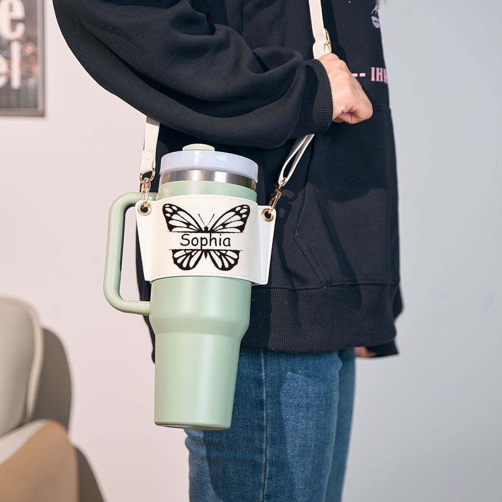 Side view showing a 40oz Stanley tumbler snugly secured in a personalised butterfly carrier pouch for drop protection