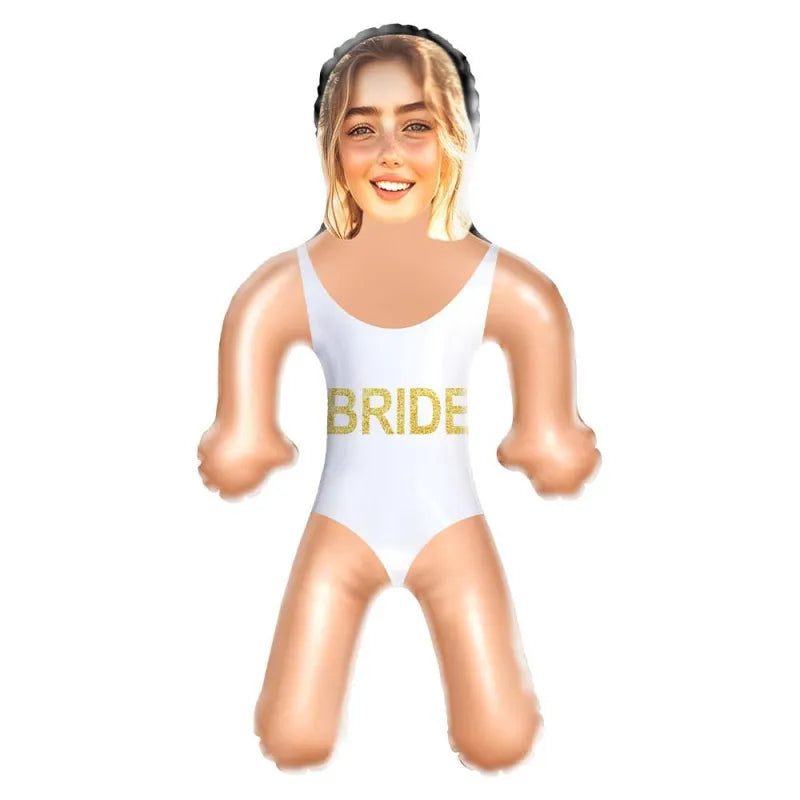Humorous bridal party scene with the personalised inflatable doll at a hen party or bridal shower.