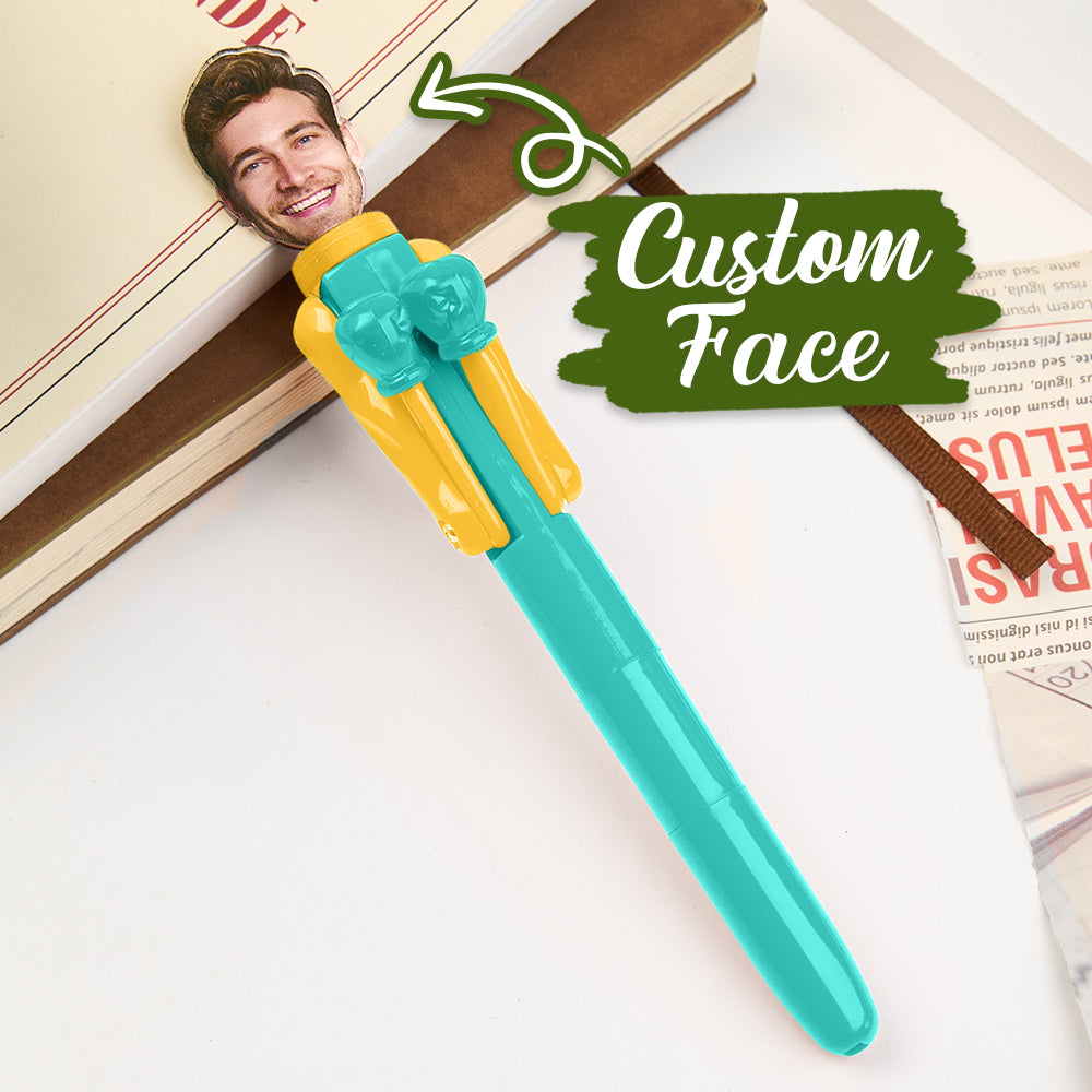 Personalised boxing pen in use writing on paper – novelty ballpoint that doubles as a stress-relief desk toy