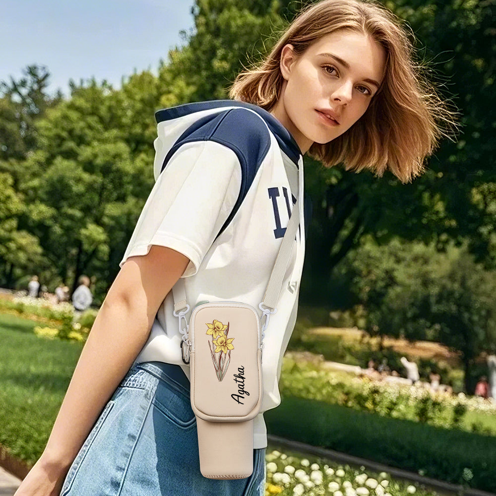 Waterproof carrier with removable organiser pouch open displaying phone and keys, practical Stanley tumbler carrier for commuting