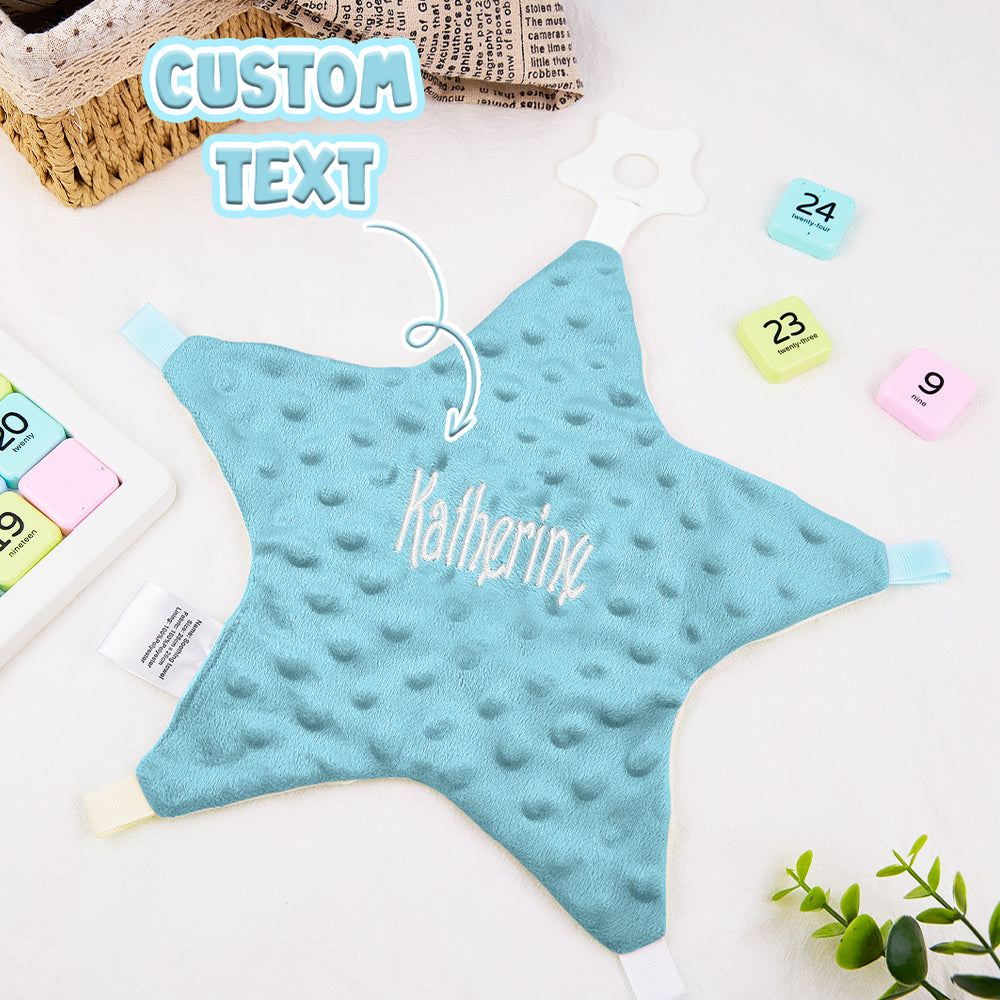 Collection of star-shaped cotton baby comforters displaying personalised embroidered name options — perfect keepsakes for newborns