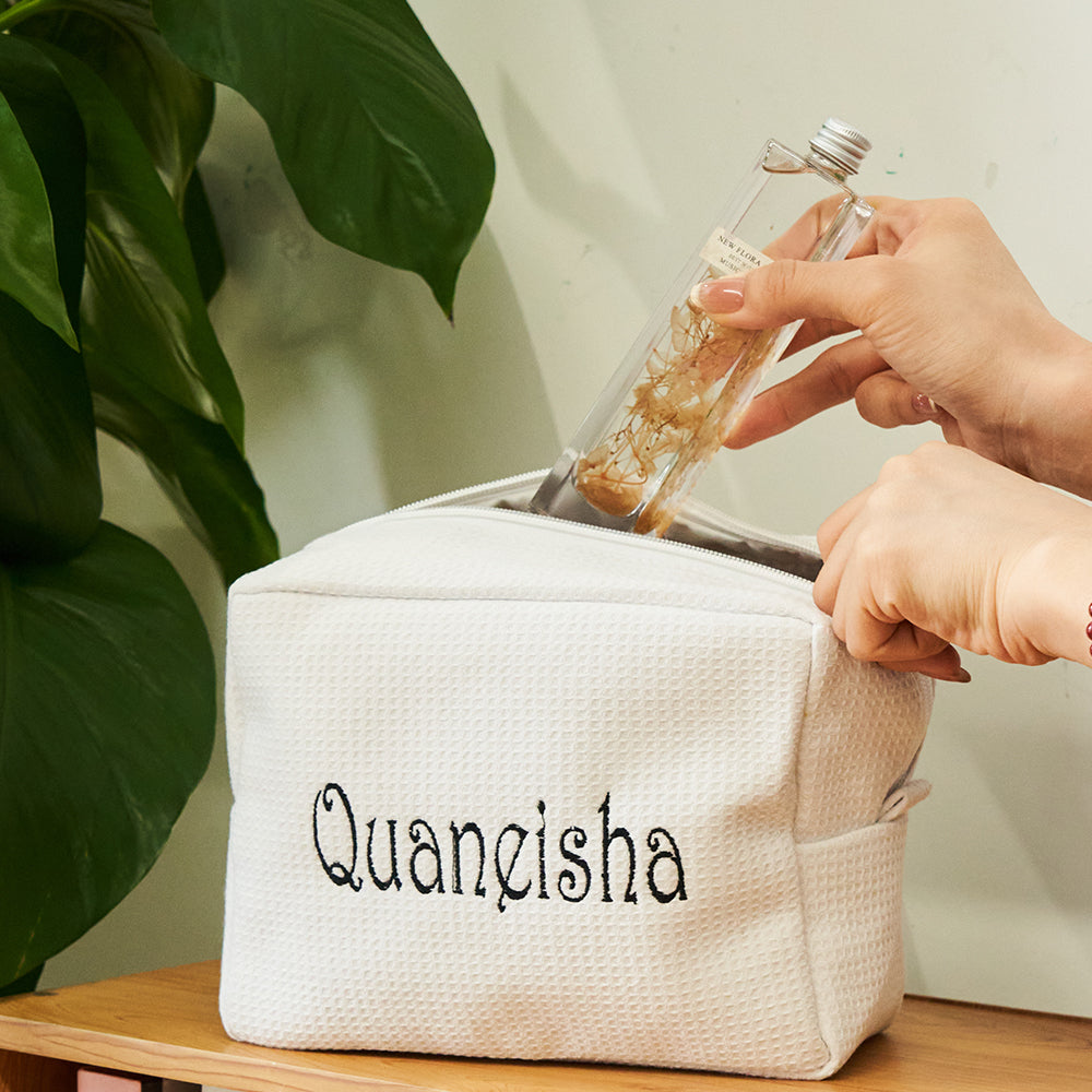 Front view of personalised waffle cosmetic organiser showing reinforced stitching and durable polyester