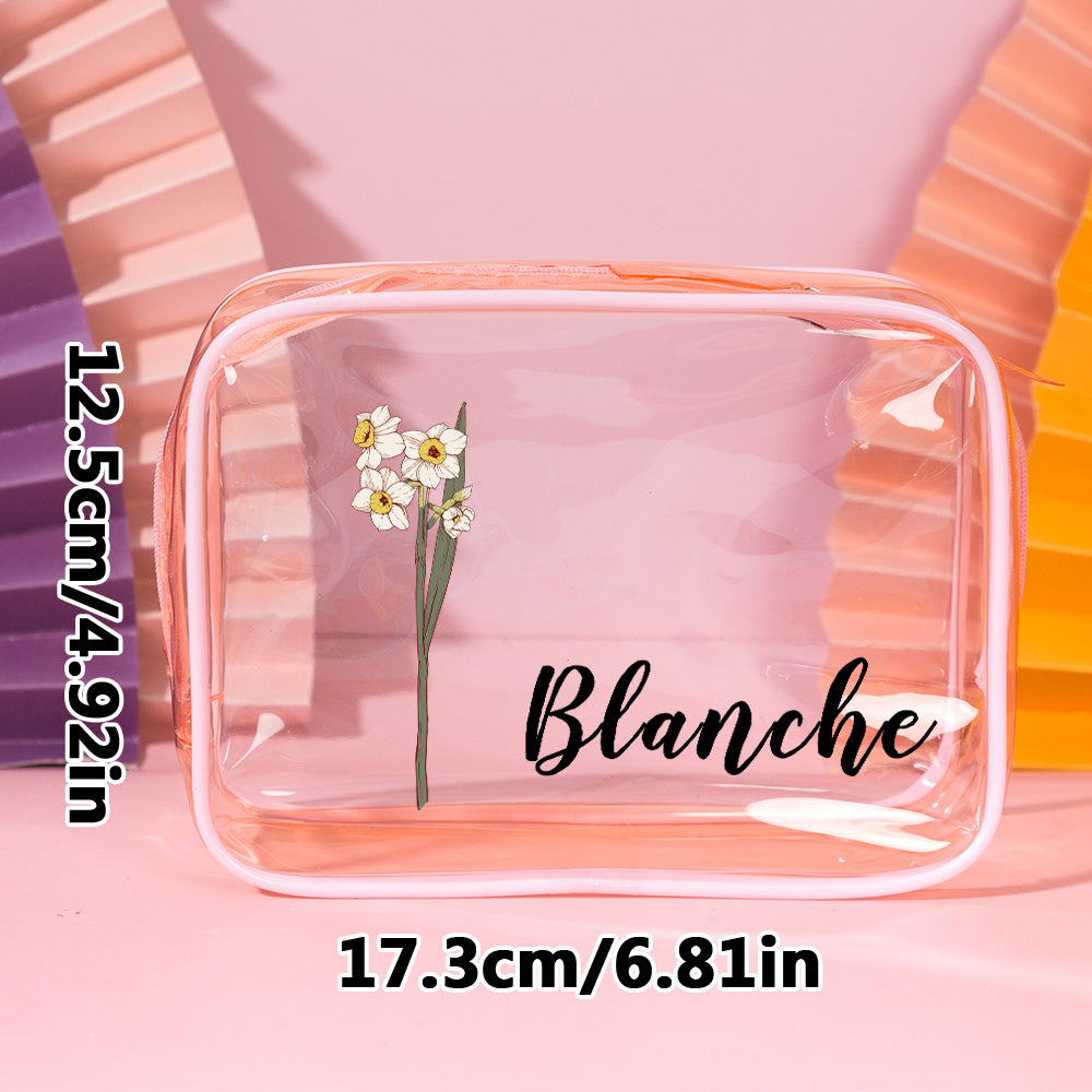 Transparent personalised birth flower makeup bag flat-lay with cosmetics – perfect personalised bridesmaid gift