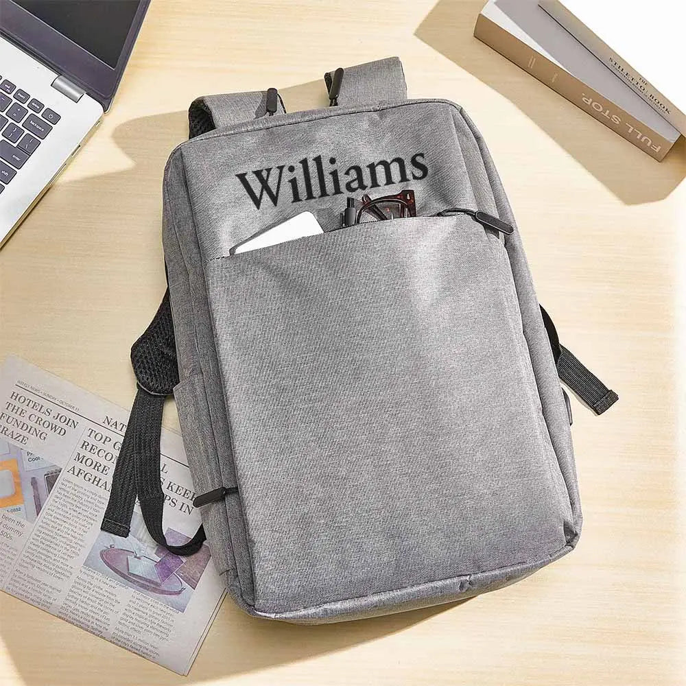 Model wearing the personalised name backpack on campus — stylish custom 15.6-inch laptop backpack for college and school