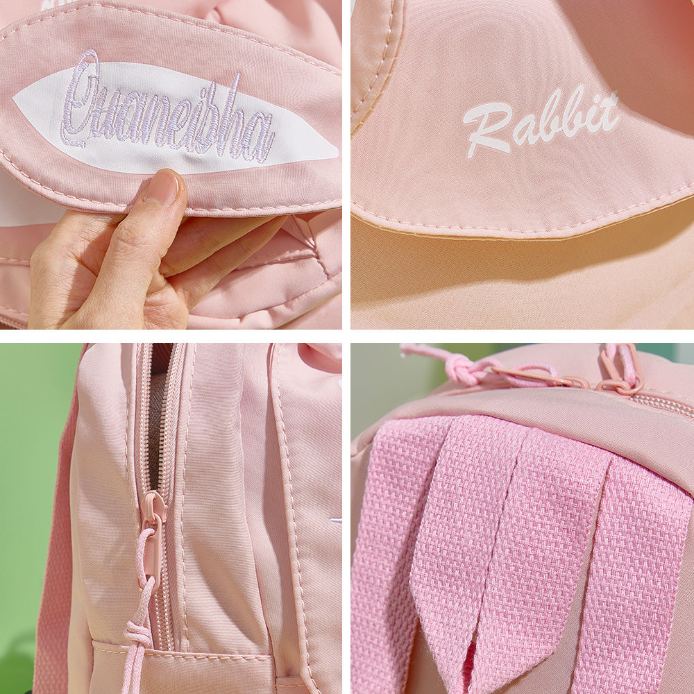 Mini rabbit backpack next to a children’s book to illustrate compact size, personalised embroidered name makes it a distinctive Easter, birthday or Christmas gift