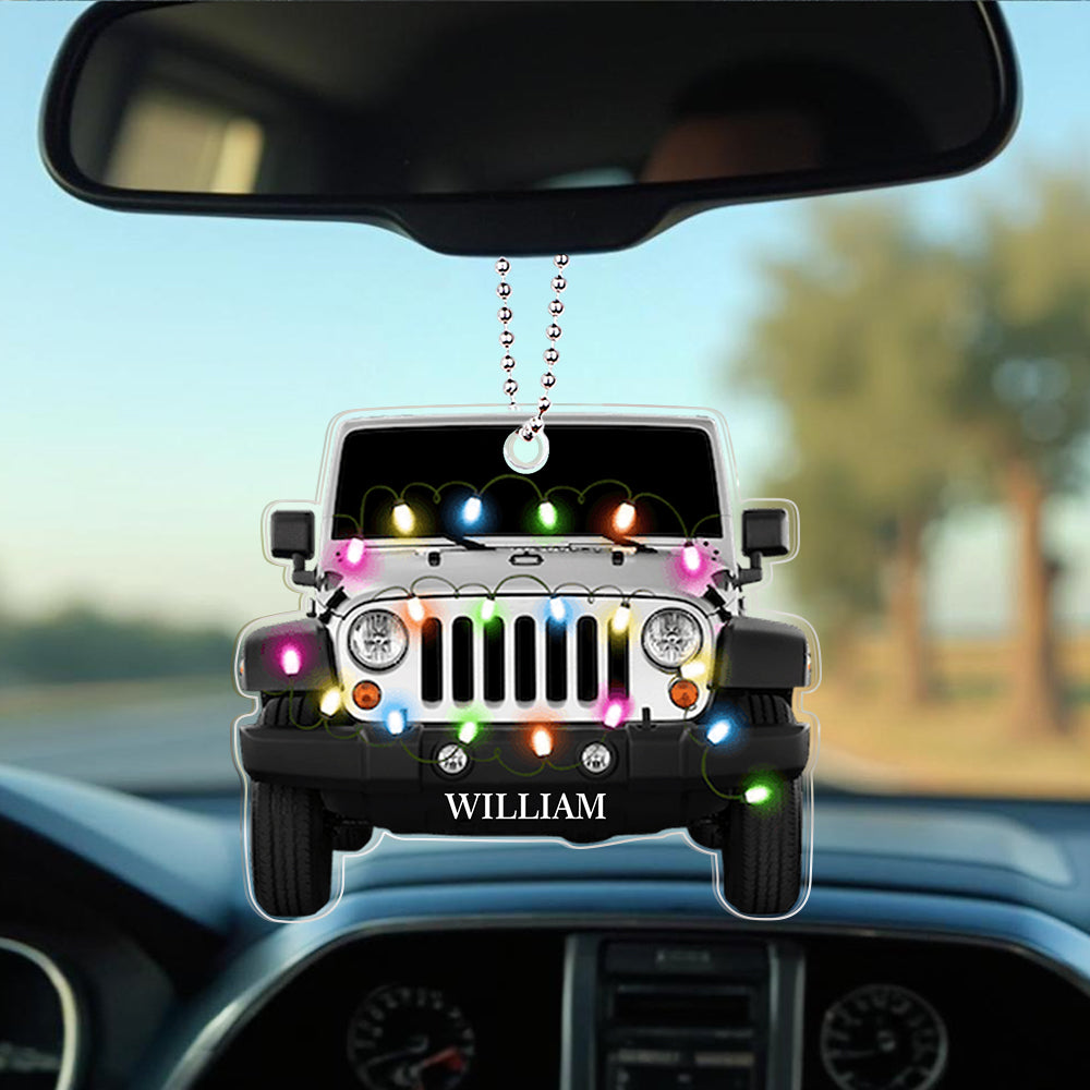 Crystal-clear personalised car ornament hanging on a festive branch, engraved name visible — bespoke acrylic keepsake for car enthusiasts