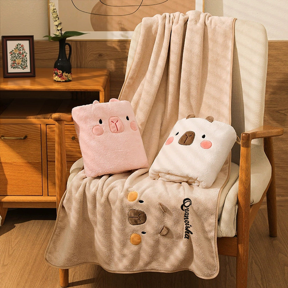 Woman unwrapping a personalised embroidered bath towel, capturing the emotional moment of receiving a luxury gift for her