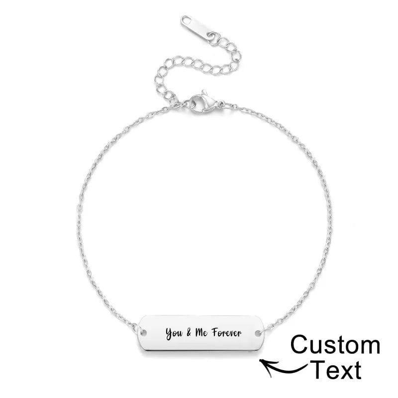 Close-up of personalised photo bracelet in silver stainless steel showing an engraved custom portrait pendant on a 22+6cm chain – personalised jewellery gift for her