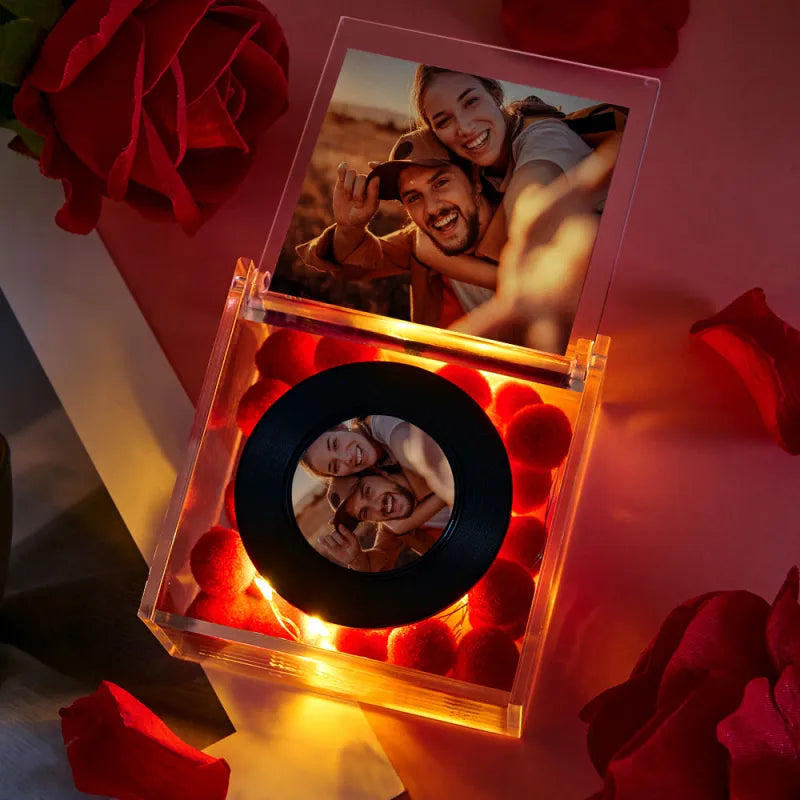 Close-up of Mini Personalised Music Box wind-up music mechanism and custom photo vinyl on acrylic retro record player
