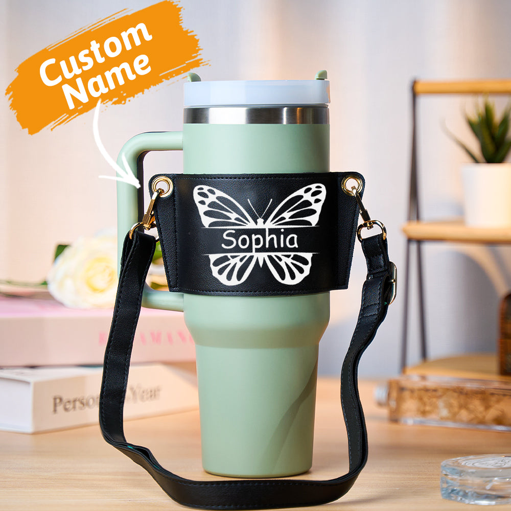 Adjustable strap and robust buckle detail of personalised water bottle carrier for 40oz Stanley tumblers — durable PU leather