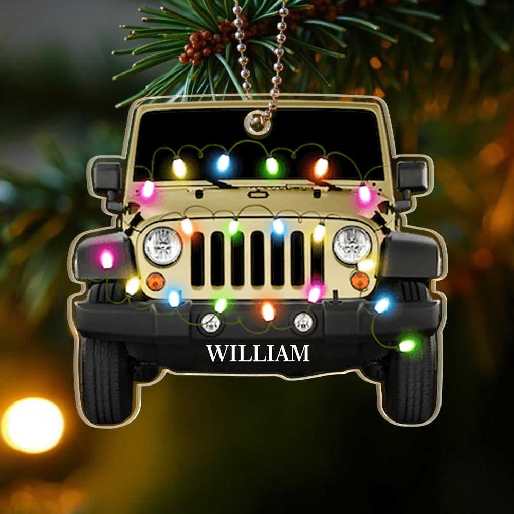 Custom acrylic car ornament laid flat to highlight fine laser-cut silhouette and personalised name engraving — ideal Christmas tree decoration or keepsake