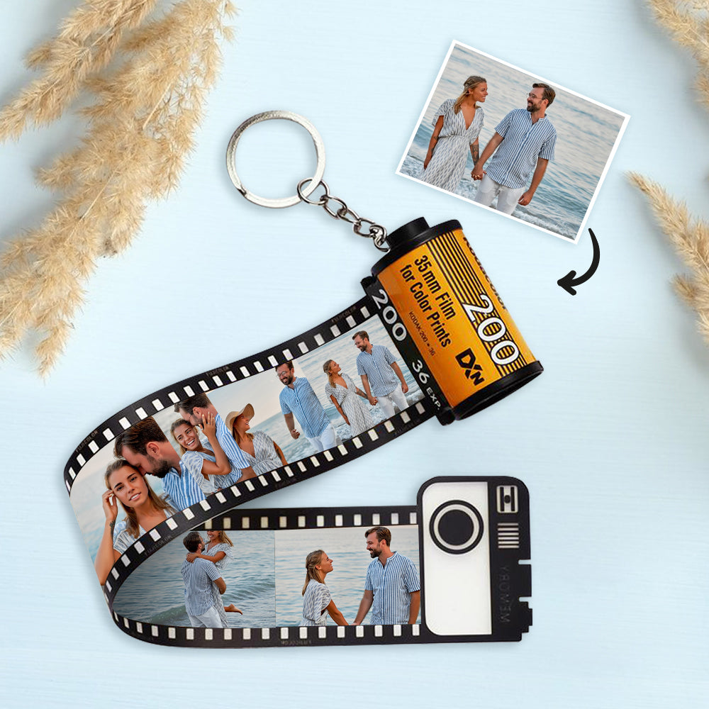 Sturdy key ring attached to the personalised film-roll keychain with a simple gift box.