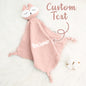 Embroidery detail and font examples for personalised baby towels, demonstrating stitching styles for a bespoke name gift