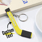 Close‑up showing where to add personalised text — customise your tiny hockey stick keyring with a name or short message during checkout