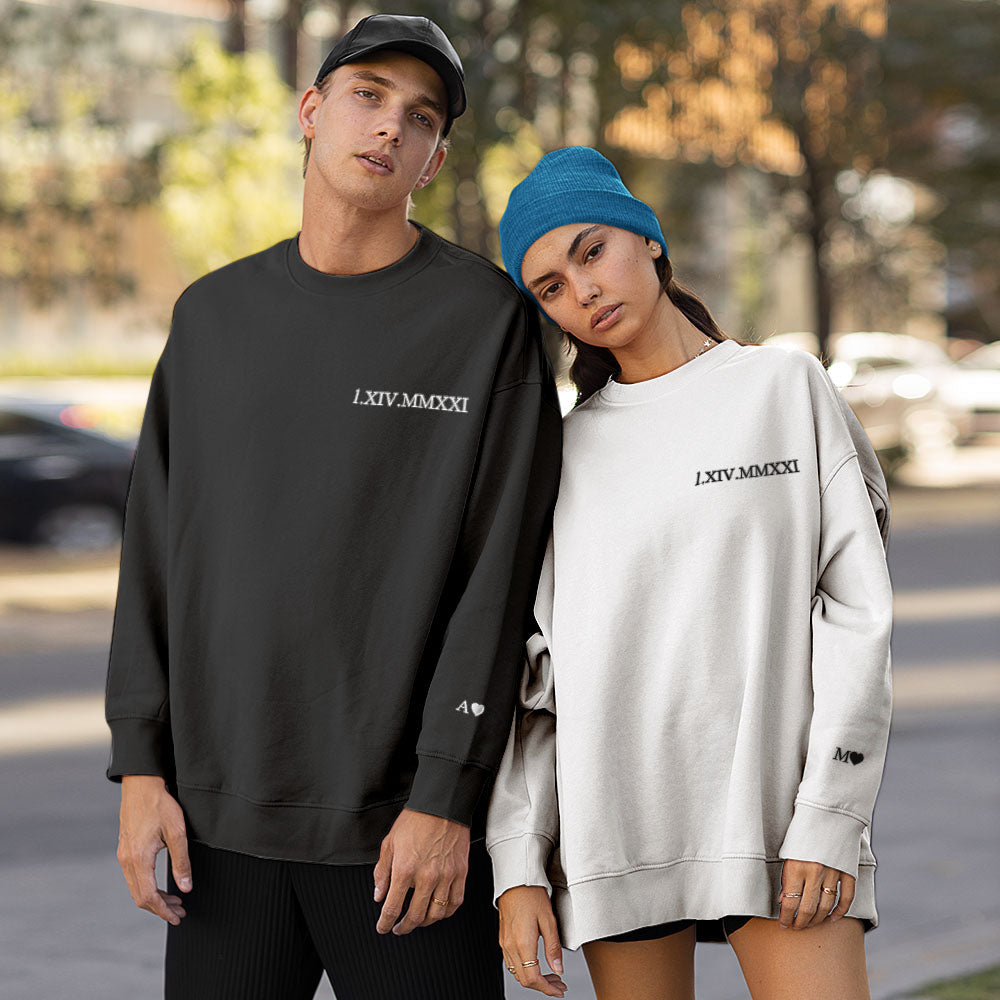 Gift-ready personalised embroidered hoodie presented as an anniversary or wedding present with custom Roman numerals
