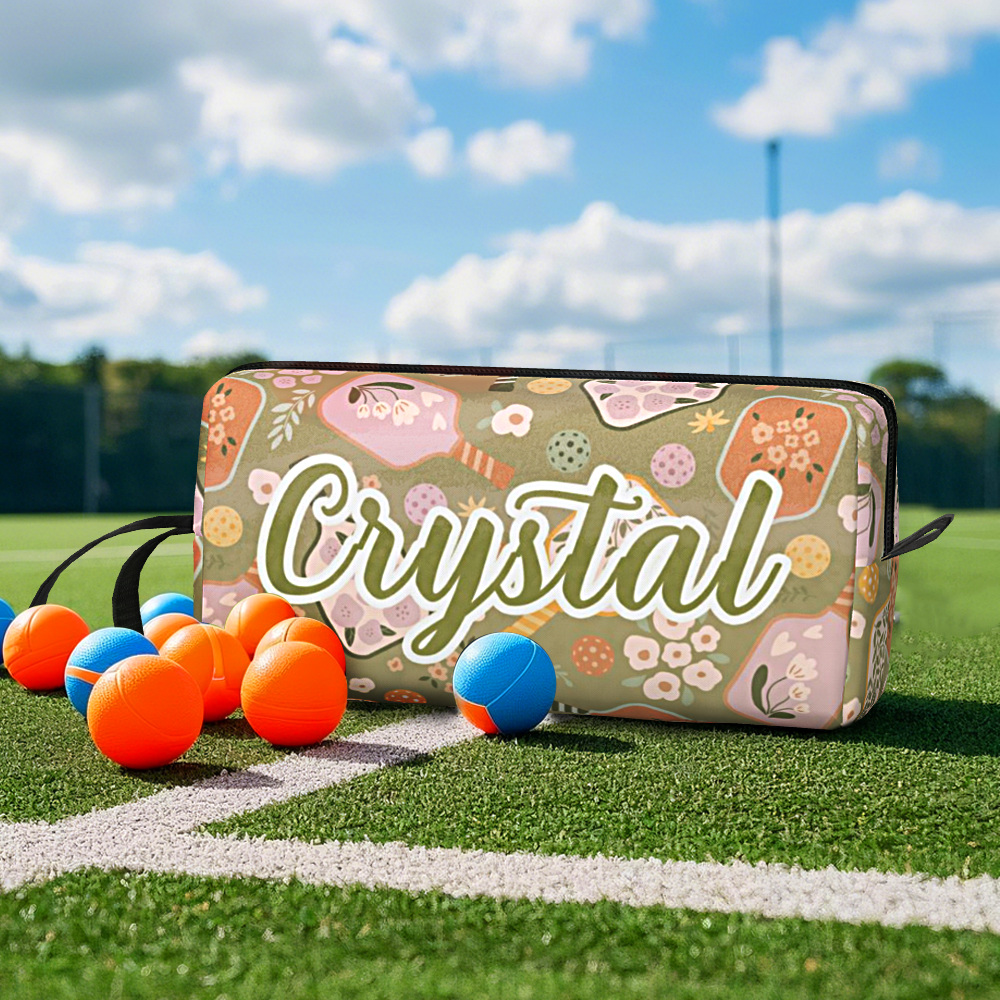 Close-up of retro floral pattern and zipper on personalised pickleball pouch showing durable polyester texture