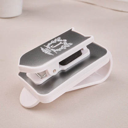 High-quality ABS plastic sunglasses holder on a car sun visor with dimensions 1.5 in × 2.68 in (3.8 cm × 6.8 cm).