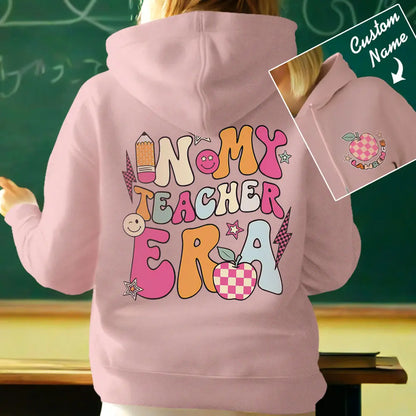 Lifestyle shot of teacher wearing personalised hoodie — cosy, practical teacher gift for back-to-school or graduation