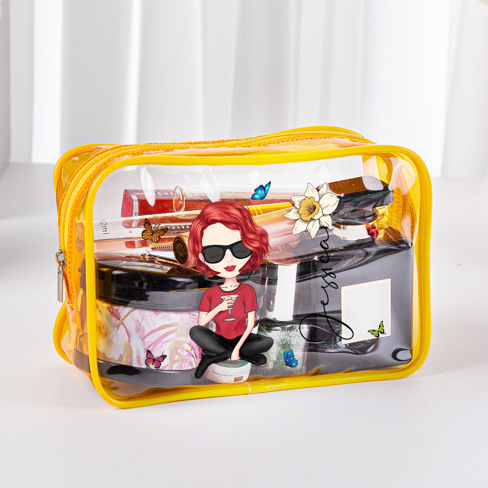Transparent personalised make-up bag shown with cosmetics inside — travel-friendly, waterproof PVC pouch for toiletries and pool essentials