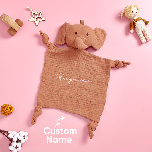 Personalised embroidered baby comfort towel in soft cotton featuring an animal face and name personalisation.