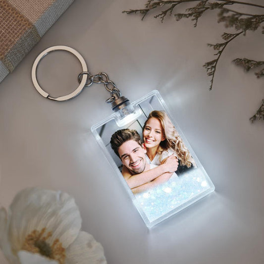 Personalised photo illuminated quicksand keychain front view showing custom image with soft LED glow and flowing sand effect, ideal personalised keyring gift