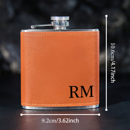 Scale view of 6oz engraved flask in hand to show compact size — pocket-friendly personalised whisky flask ideal for travel and special occasions