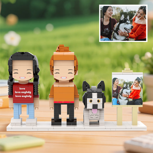 Framed custom full‑body personalised brick figures of two people and a dog on a white background — ideal anniversary and birthday gift keepsake