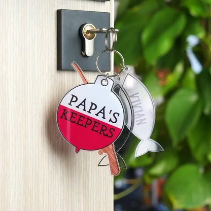 Pair of fishing rod and fish acrylic keyrings showing detailed printed artwork and customisable text — personalised fishing gift
