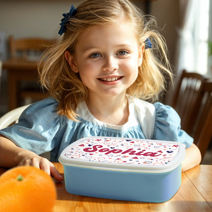 Child holding personalised cute lunch box with name at school — back-to-school and birthday gift idea for boys and girls, encourages belonging and tidy lunches