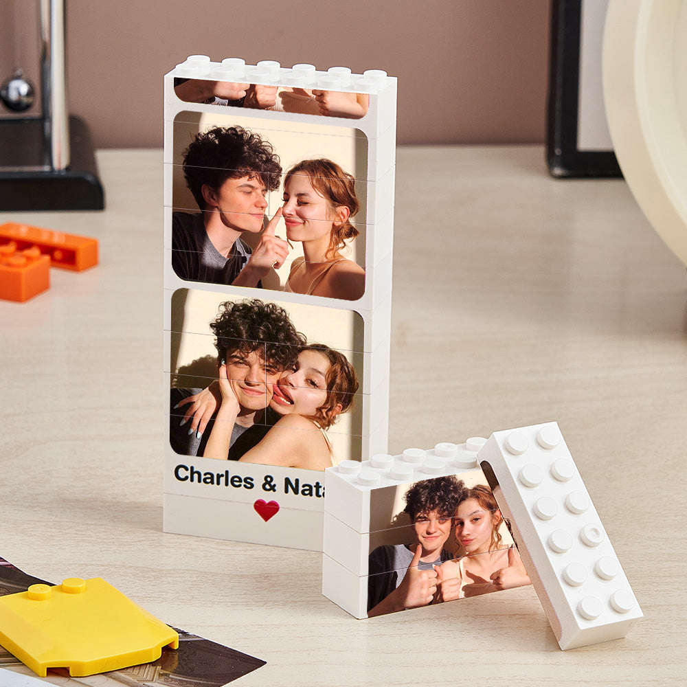 Hand assembling a personalised building block picture brick puzzle to show tactile puzzle function — charming personalised gift for a partner
