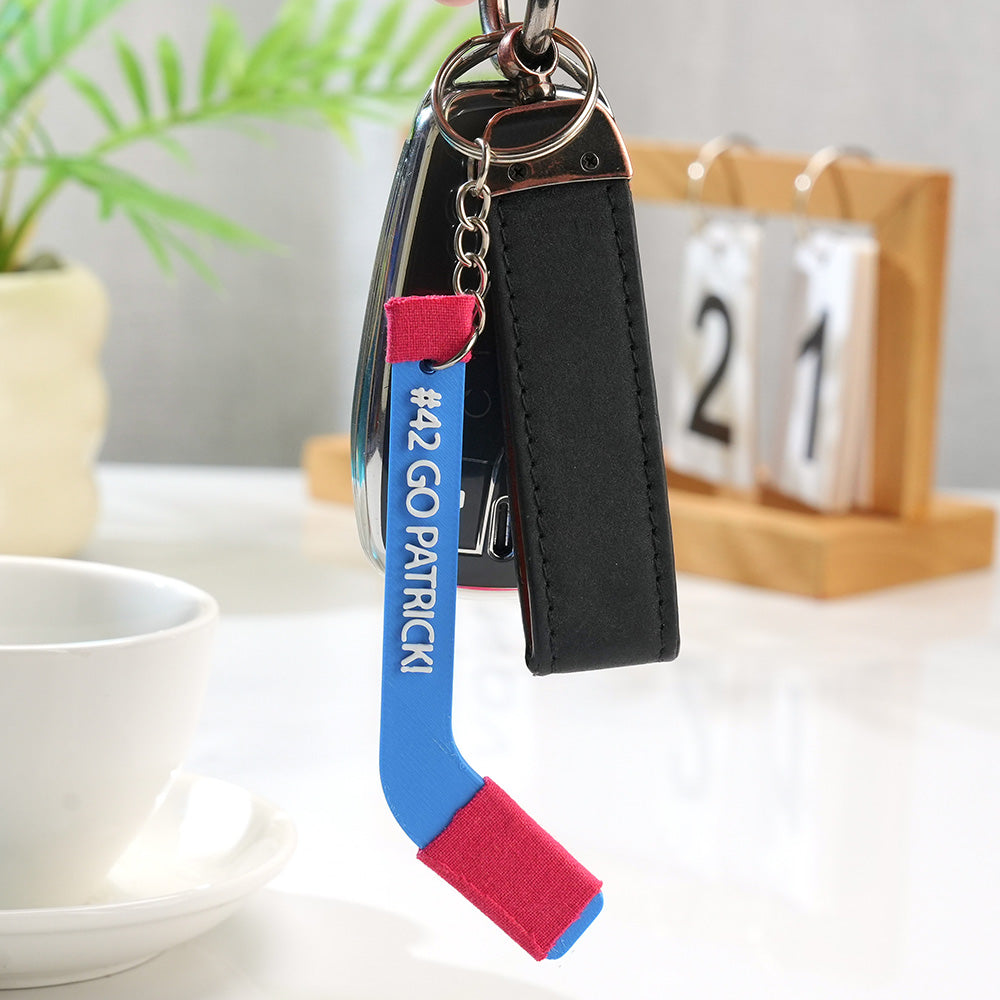 Personalised 3D‑printed tiny hockey stick keyring in PLA — custom coach keepsake with smooth high‑quality finish, ideal gift for hockey lovers