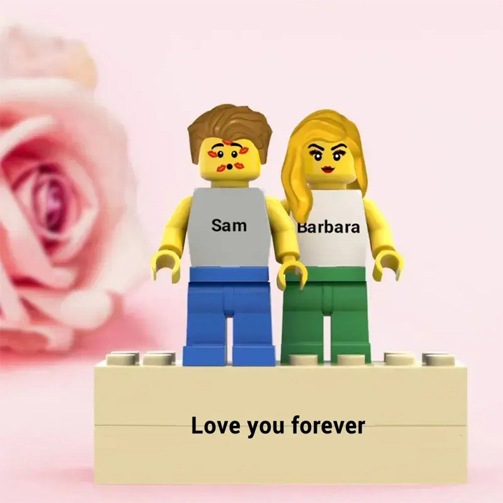 Personalised minifig pair posed on an engraved base ready for display on a shelf or desk – ideal anniversary keepsake