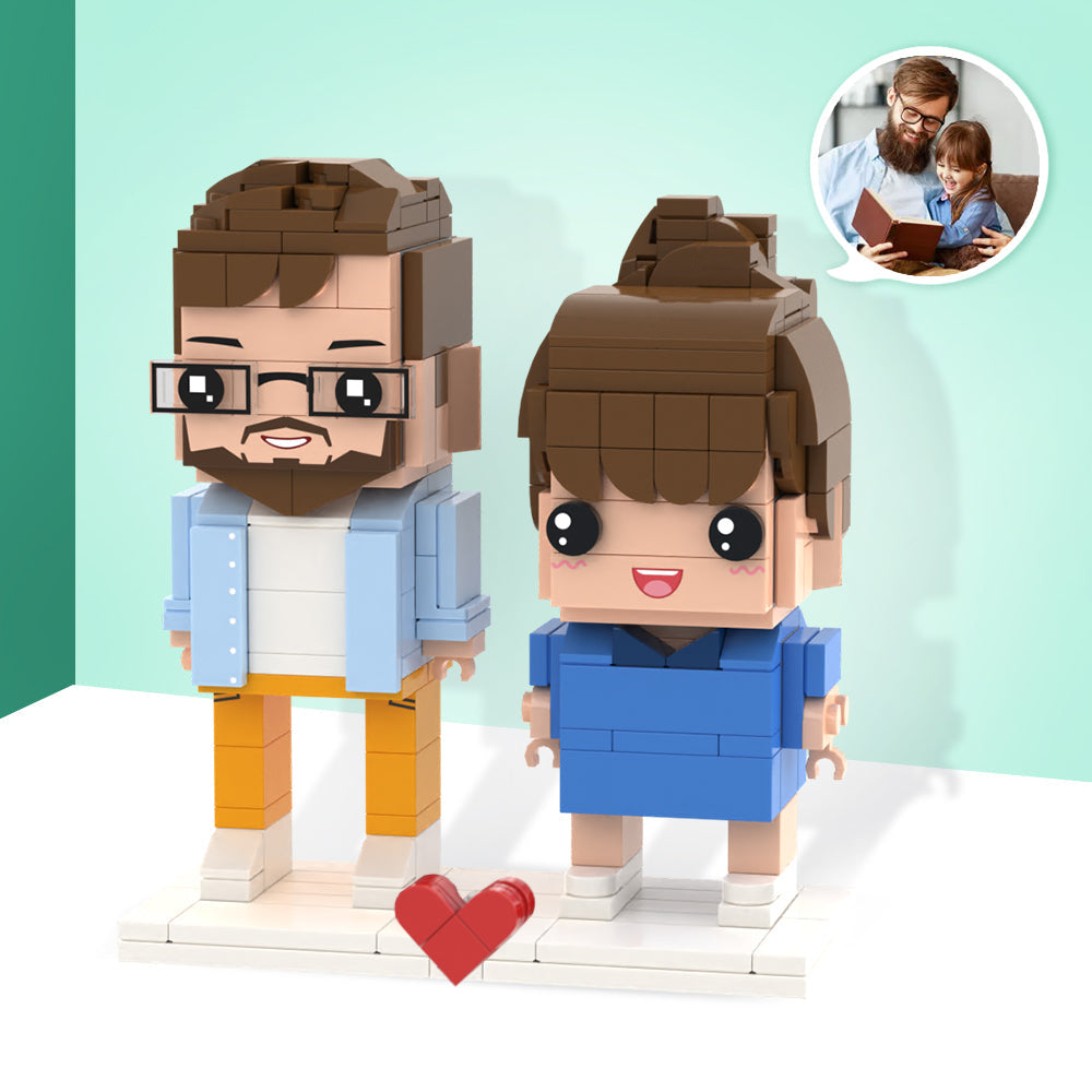 Close-up of personalised brick figures showing detailed facial features, customised hairstyles and outfits for a bespoke couple keepsake