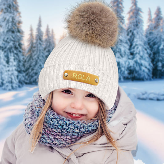 Personalised Name Beanie with leather patch — front view of custom name beanie, soft acrylic newborn and kids winter hat