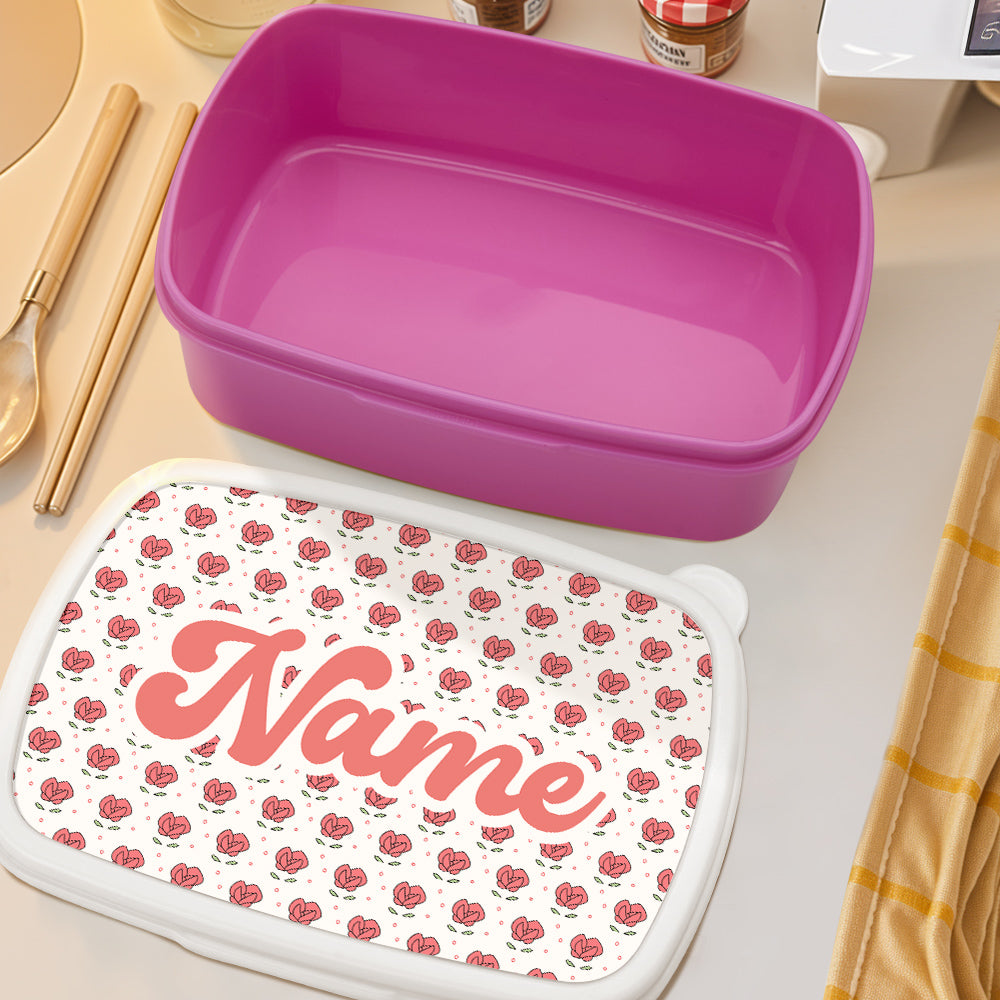 Close-up of cute floral print and personalised name on a lightweight plastic lunch box — ideal personalised lunch box for children