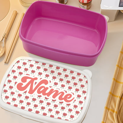 Close-up of cute floral print and personalised name on a lightweight plastic lunch box — ideal personalised lunch box for children