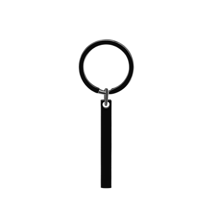 Lifestyle shot of personalised music keychain hanging on a bag demonstrating durable stainless steel build and stylish design