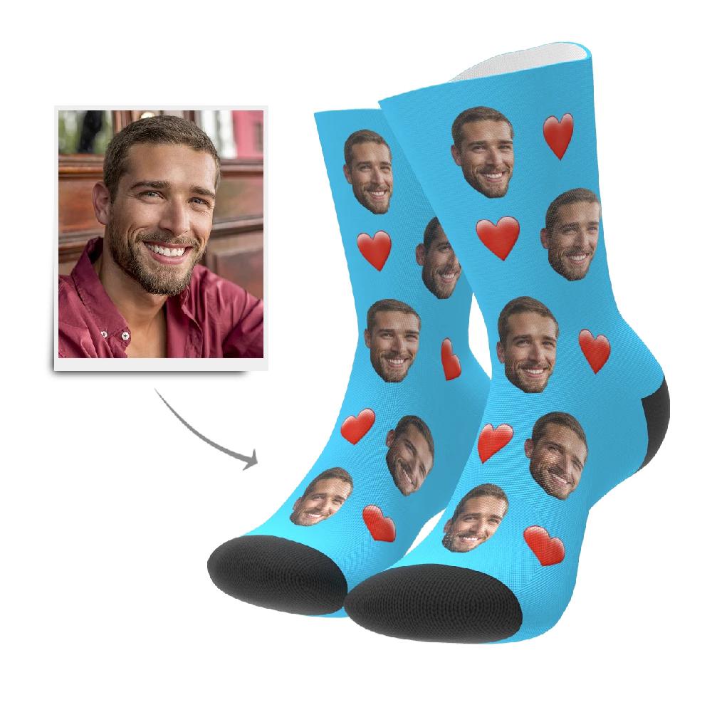 Man and woman wearing personalised face socks with heart — cosy unisex custom photo socks for home and travel