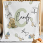 Angle shot of Winnie the Pooh blanket highlighting soft texture and print.