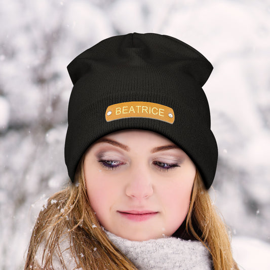 Front view of personalised leather patch beanie with custom name hot-stamped on the leather patch, knitted acrylic winter hat