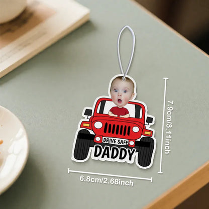 Close-up of the felt texture and personalised text on the air freshener.