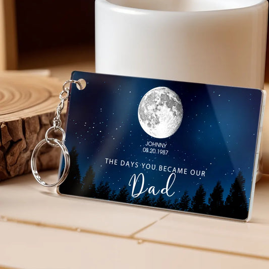 Personalised Starry Night 'The Day You Became Dad' acrylic keyring showing the custom moon phase and engraved text on a starry background, custom moon phase acrylic keychain