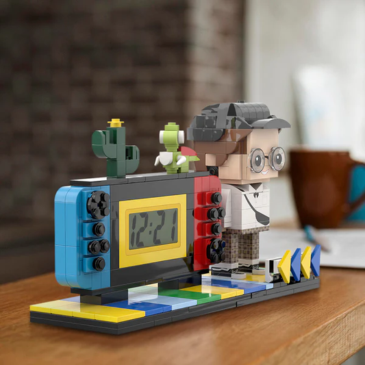 Personalised brick figures clock in handheld game console style, front view showing custom minifigure portrait and clock display — perfect personalised photo gift for him and gamers