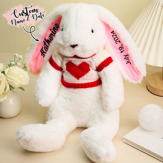 Front view of personalised jumper bunny plush with embroidered name on cosy sweater, perfect personalised bunny soft toy gift for children