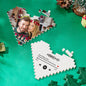 Close-up of custom text printed on heart-shaped building bricks showing personalised name and short message option